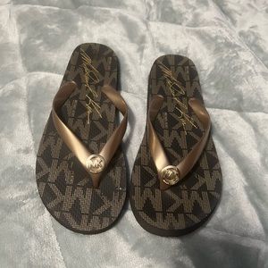 Michael Kors flip flops